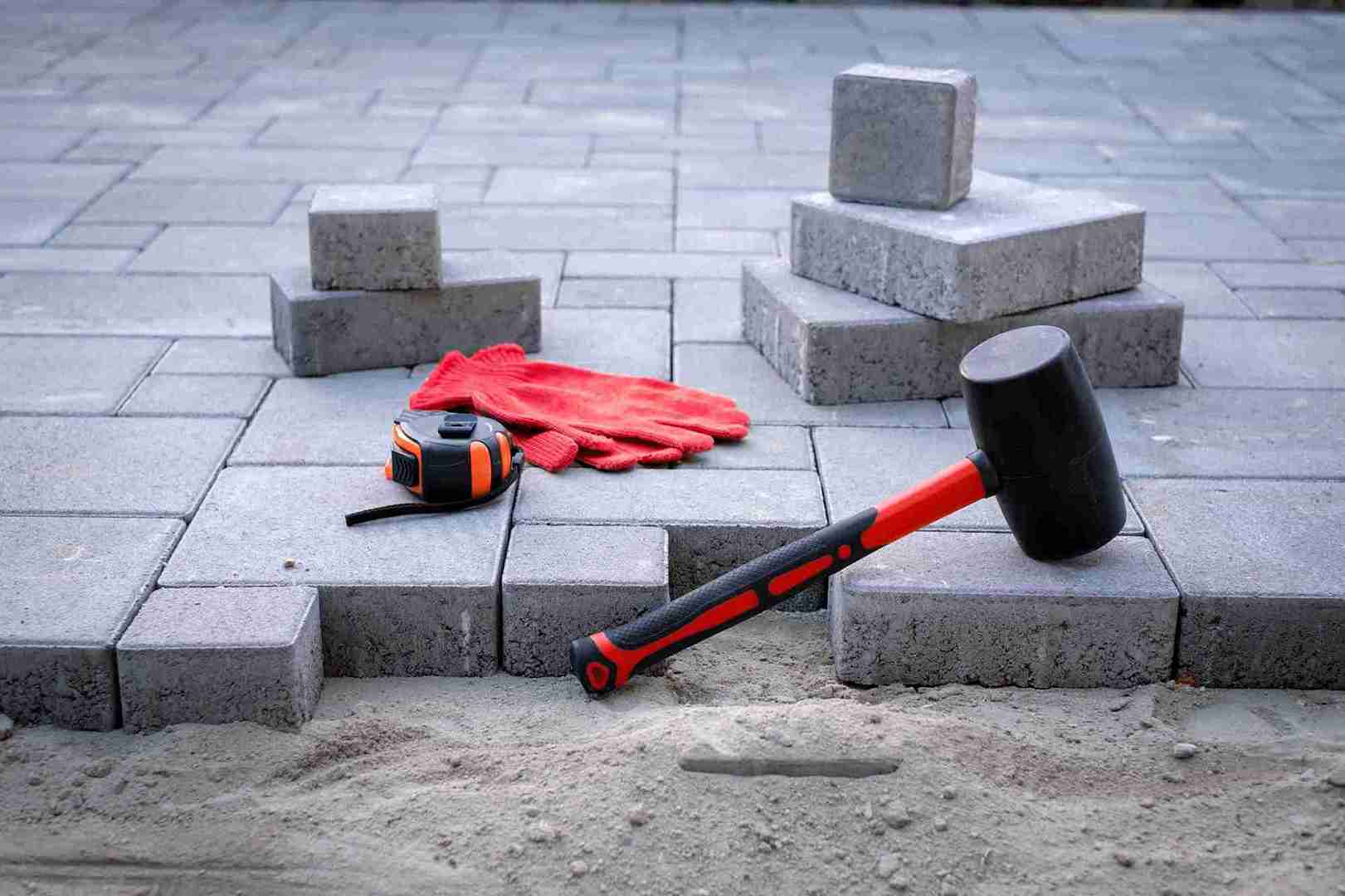 paving stones mallet and safety gloves on ground 2026 03 19 08 13 44 utc_11zon