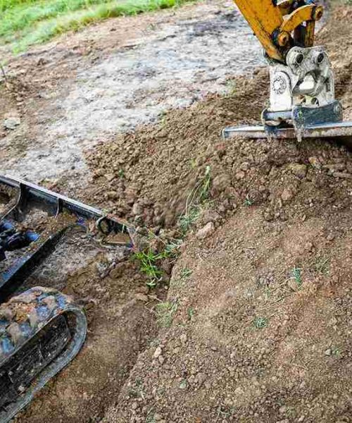 mini-excavator-digging-preparing-ground-under-home-2026-03-10-22-30-48-utc (1)_11zon