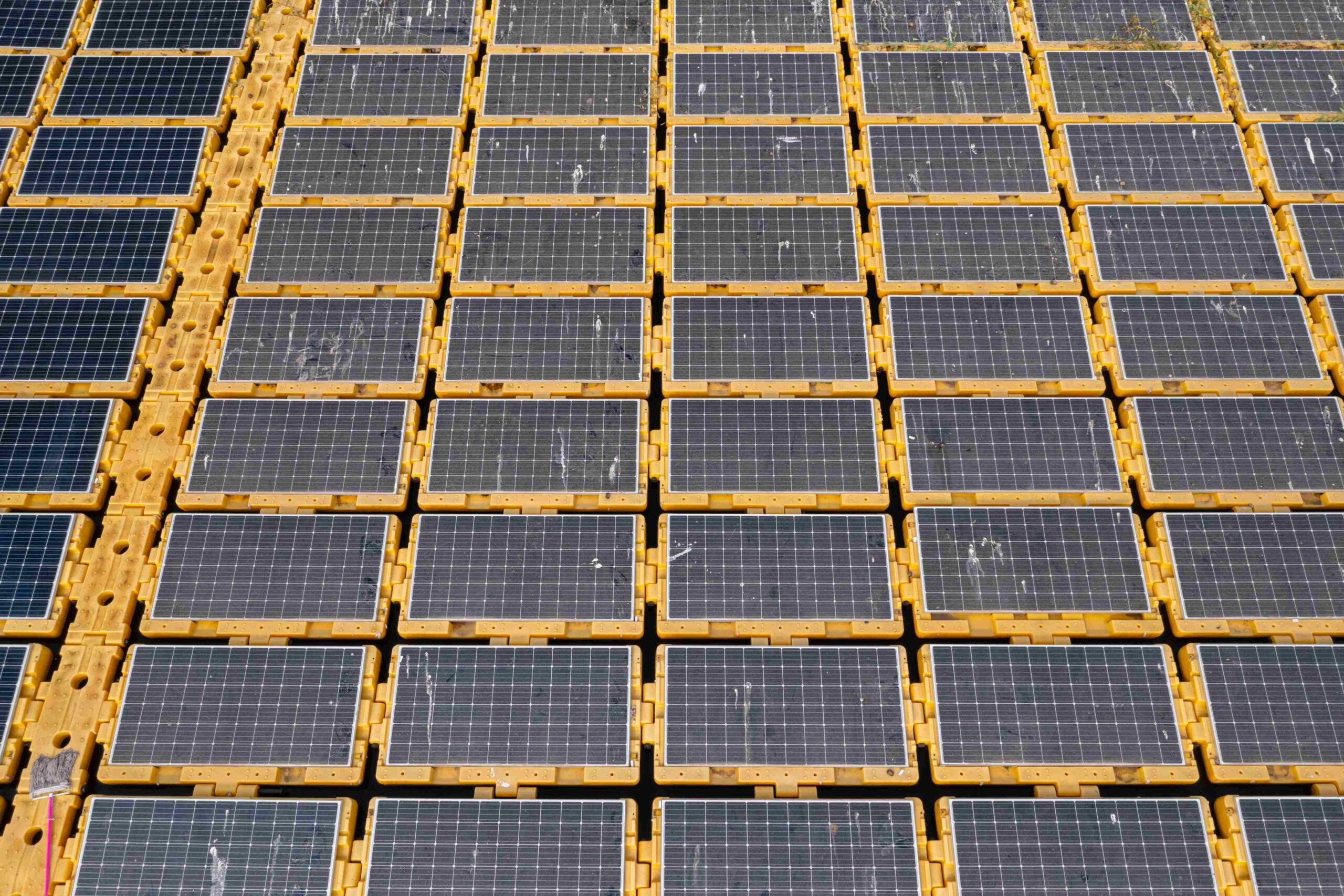 aerial-view-of-solar-panel-array-on-water-2026-03-20-06-14-25-utc_11zon